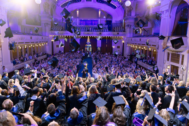 Alt Text Students celebrating during the UNYP Graduation Ceremony at Obecní dům in Prague