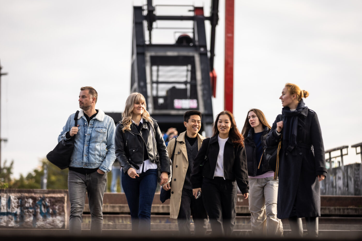 Group of international students walking together outdoors in Prague