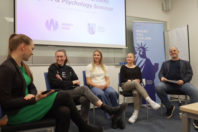 Panel discussion at UNYP Women's Empowerment: Sport and Psychology event featuring athletes, coaches and sports psychology experts.